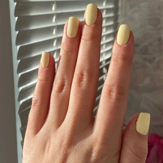 Glossy Pastel Yellow Nails